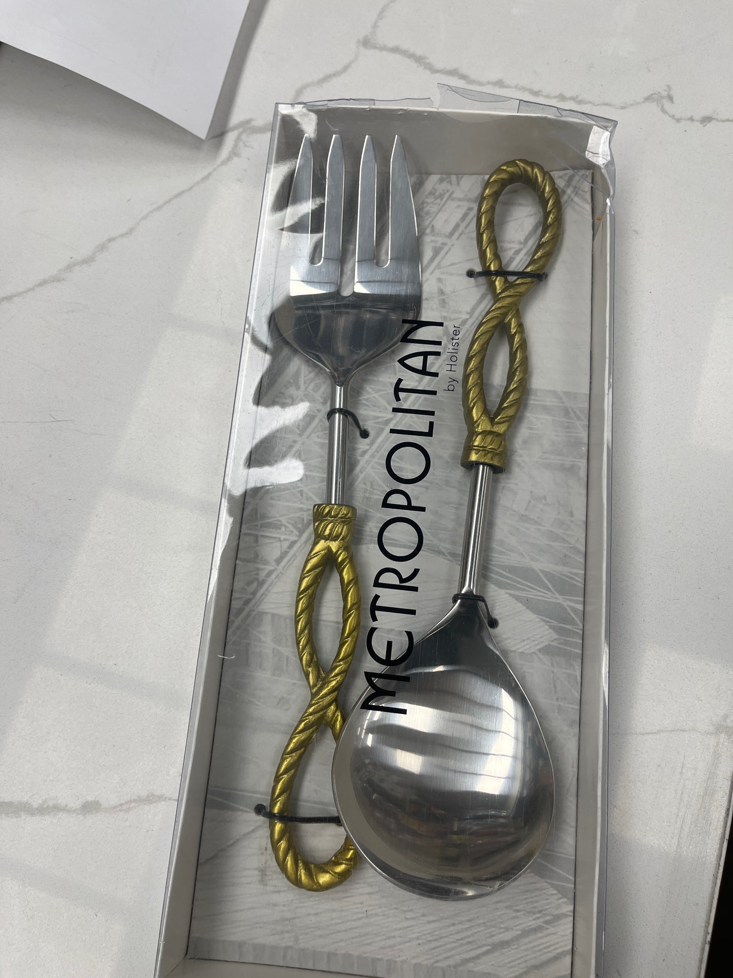 Metropolitan gold plated serving pieces