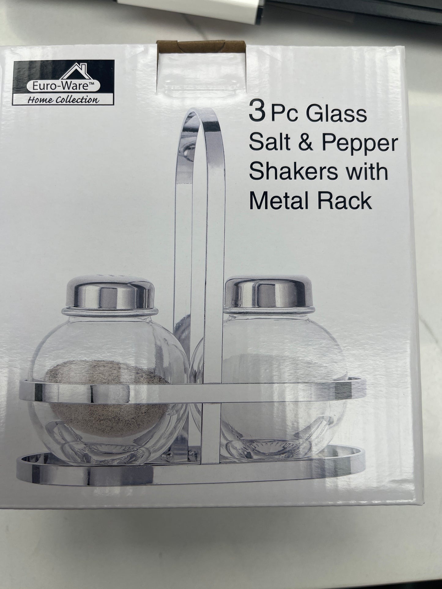 Salt and pepper shaker with metal rack