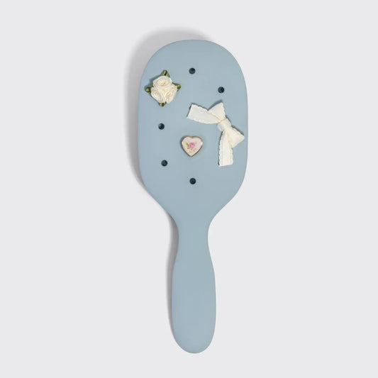 Kit.sch/ customizable four piece paddle brush