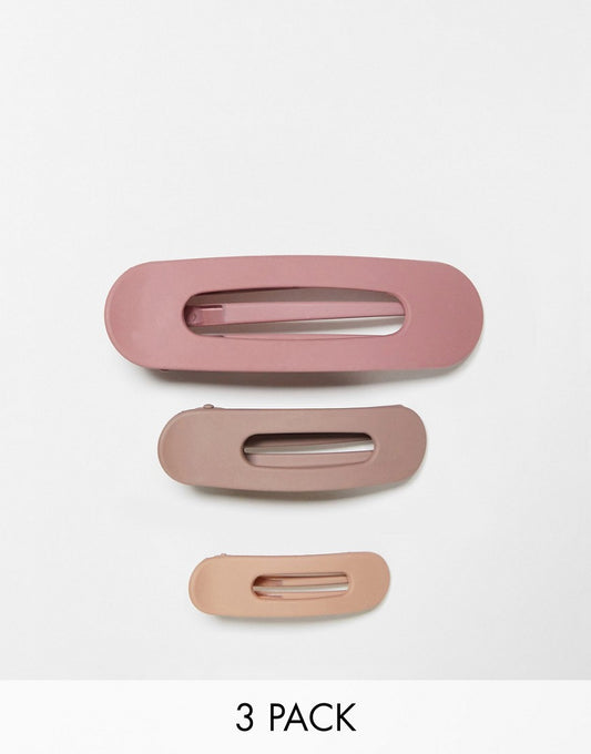 Kit. Sch flat lay claw hair clips