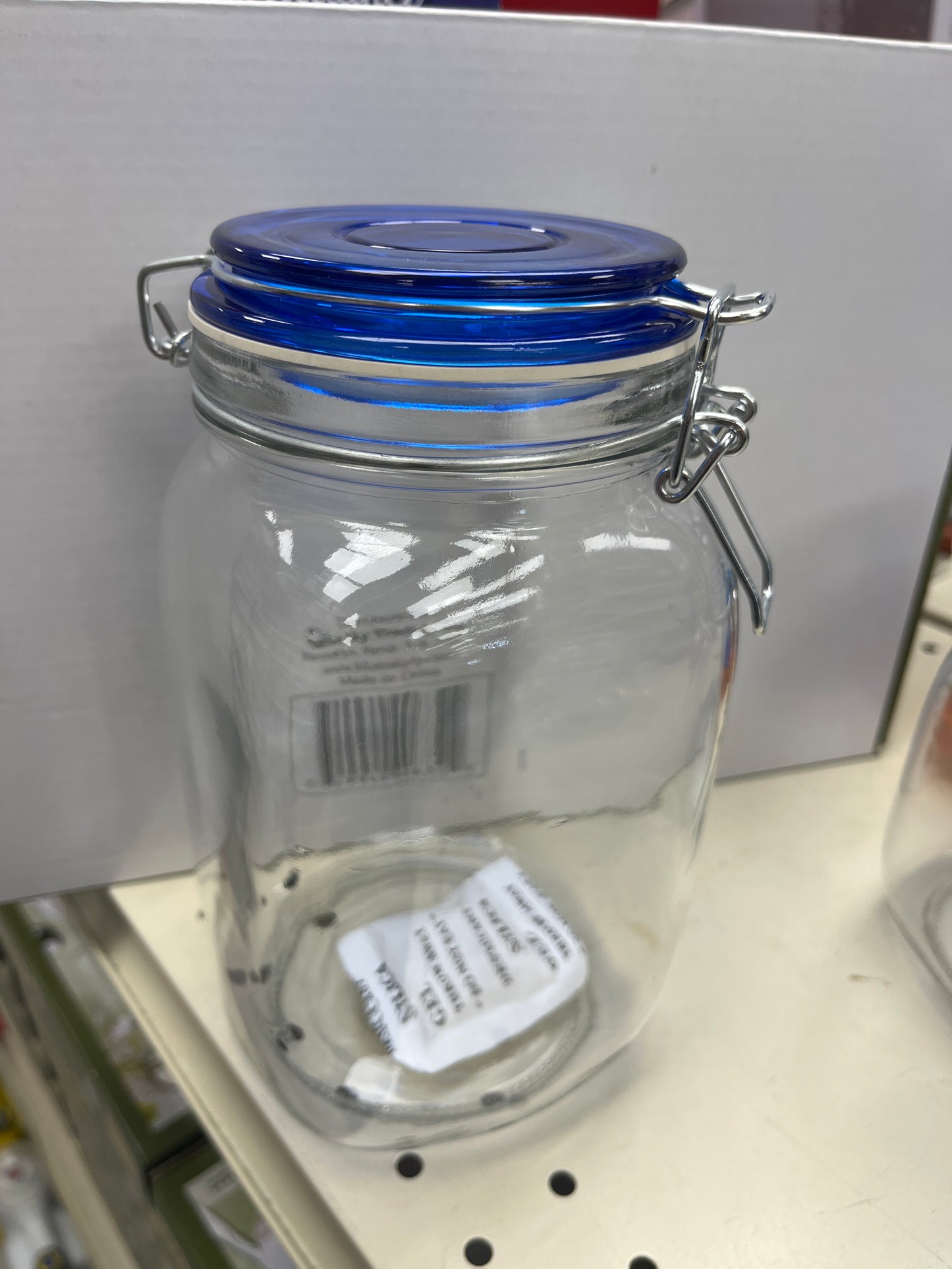 Glass jar blue top tall