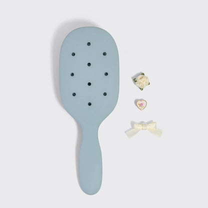 Kit.sch/ customizable four piece paddle brush