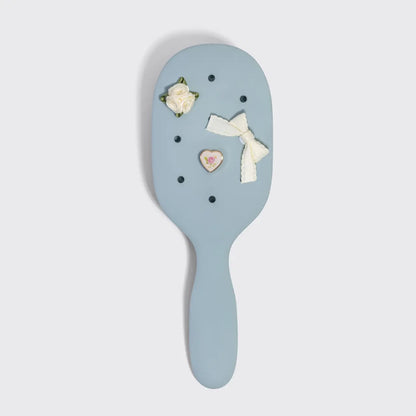 Kit.sch/ customizable four piece paddle brush