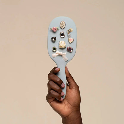 Kit.sch/ customizable four piece paddle brush